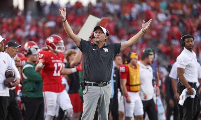 Houston Cougars head coach Dana Holgorsen reacts after a play during the fourth quarter against the Texas Longhorns at TDECU Stadium.